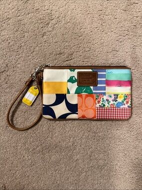 Coach Multi-Color Patchwork Wristlet with Tan Leather Trim